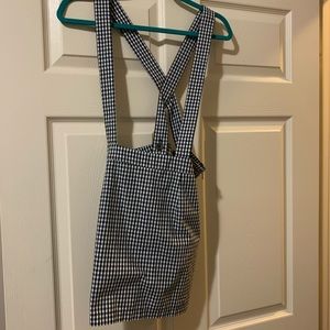 Black and white suspenders dress